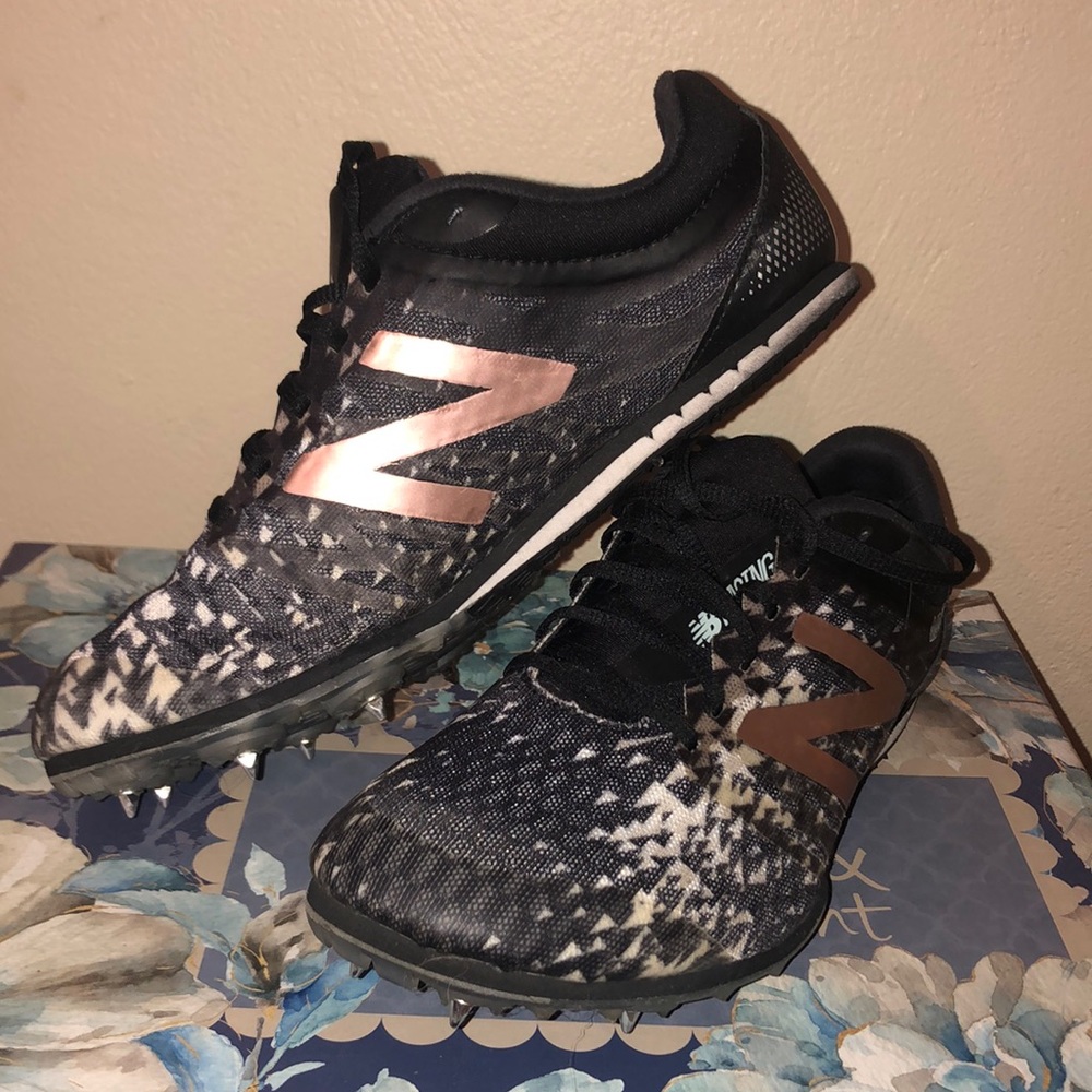 Running shoes (track or cross country spikes)